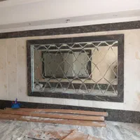 آ جورچین|آینه|فردیس, منظریه|دیوار