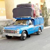 کامیون نیسان وانت به همراه نیرو کار
