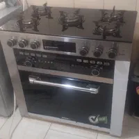 اجاقگاز طرح فر تکنو تایمر زمان پخت فلش خور AUX