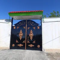 رنگ زنی شیروانی درب حیاط