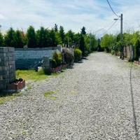 زمین قابل ساخت۲۱۵متری/درشهرک/باسند/منطقه جنگلی