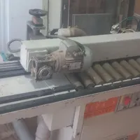دستگاه لبه چسبان سه ایستگاه هلزمک