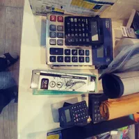 لوازم التحریر ماشین حساب و پانچ و منگنه