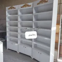 پیشخوان کشودارچوبی ویترین پشت شیشه قفسه دکور۰