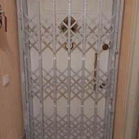 حفاظ کشویی درب اکاردیونی ضدسرقت ریلی فلزی آپارتمان