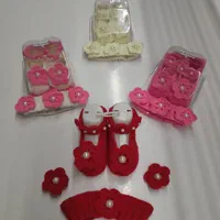 پاپوش ست همراه با تل و گیره سر نوزادی سیسمونی