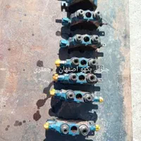 تعمیرات شیر کنترل و پمپ بیل بکهو ایرانی و خارجی|ماشین‌آلات صنعتی|ابریشم, |دیوار