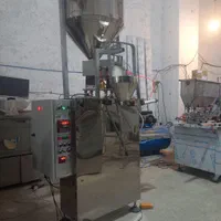 دستگاه فیلینگ توزین پرکن بسته بند ماشین ساز حبوبات
