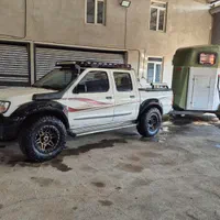 اسبکش اکباتان همراه با خودروی نیسان پیکاپ