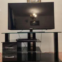 میز تلویزیون شیشه ای