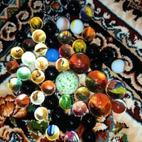 تیله با دستکش بکس و چندین اسباب بازی توضیحات بخون