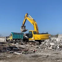 بیل‌مکانیکی کمپرسی، خاکبرداری، تخریب ساختمان