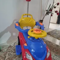 ماشین حمل کودک موزیکال دسته دار