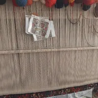 قالی نیمه بافته