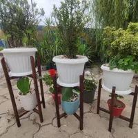 استند چوبی گلدان عمده و تکی بارنگ و سایز های مختلف|صنایع دستی و سایر لوازم تزئینی|رشت, شهرک احمد خمینی|دیوار