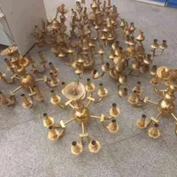 فروش‌و‌‌ خریدار لوستر طلایی و اینه و شمعدان برنزی