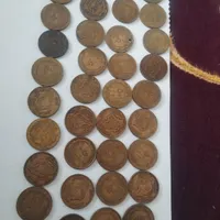 تعدادی سکه پنجاه ریالی مسی و پنج ریالی پهلوی
