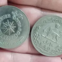 دو عدد سکه المپیک و کسی ک گندم میکارد