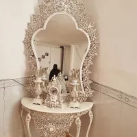 آیینه و شمعدان و ساعت