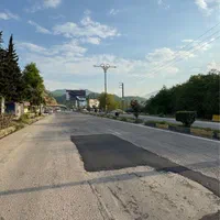 فروش زمین تجاری ۷۰۰ متری همراه یک مغازه در چالوس