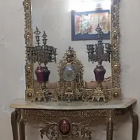 آیینه شمعدان و ساعت برنجی