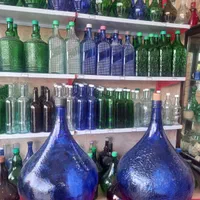 بطری شیشه ای ۱۲ لیتری|ظروف نگهدارنده، پلاستیکی، یک‌بارمصرف|اصفهان, باغ فدک|دیوار