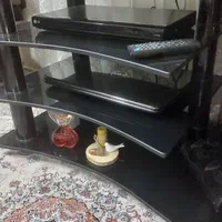 میز تلویزیون شیشه ای کشودار