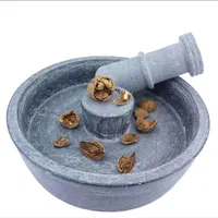 گردوشکن سنگی|ظروف پخت‌وپز|مشهد, خین عرب|دیوار