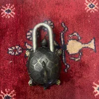 قفل لاک پشتی|کلکسیون اشیاء عتیقه|اصفهان, رزمندگان|دیوار