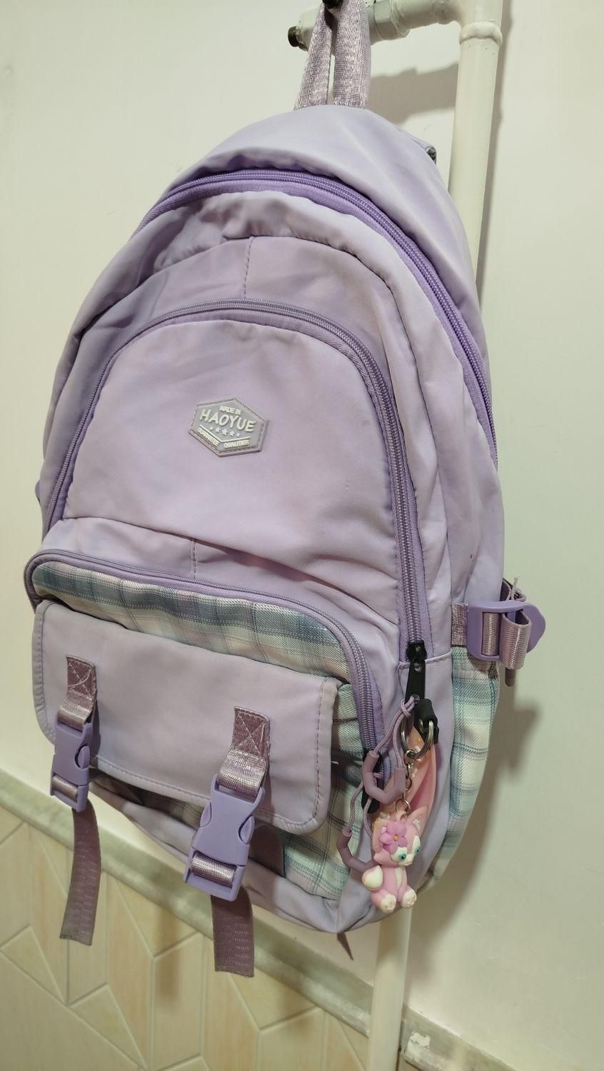 کیف مدرسه نو نو|کیف، کفش، کمربند|قم, چهل درخت‎|دیوار