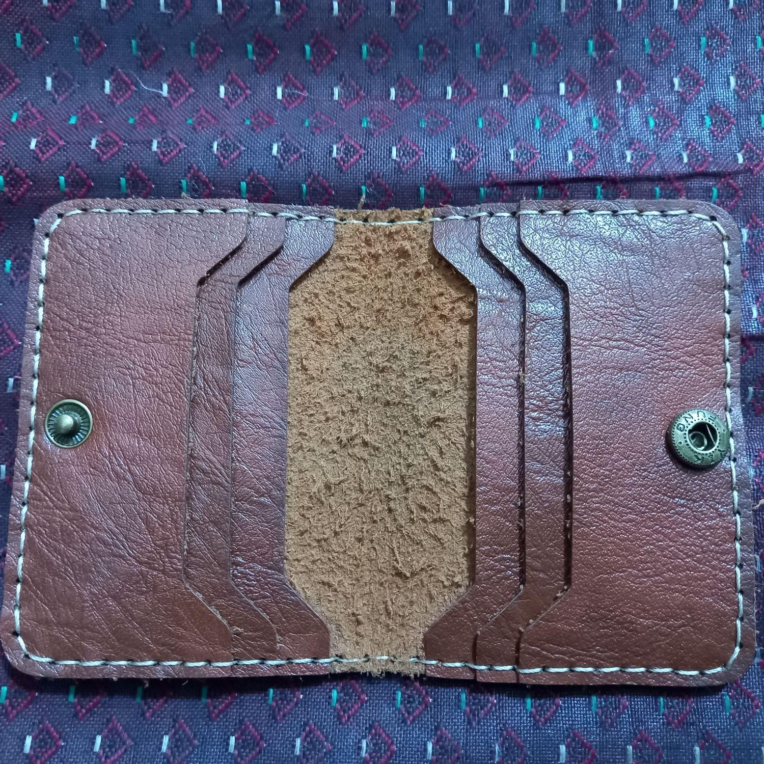 یک عدد کیف پول|کیف، کفش، کمربند|اقبالیه, |دیوار