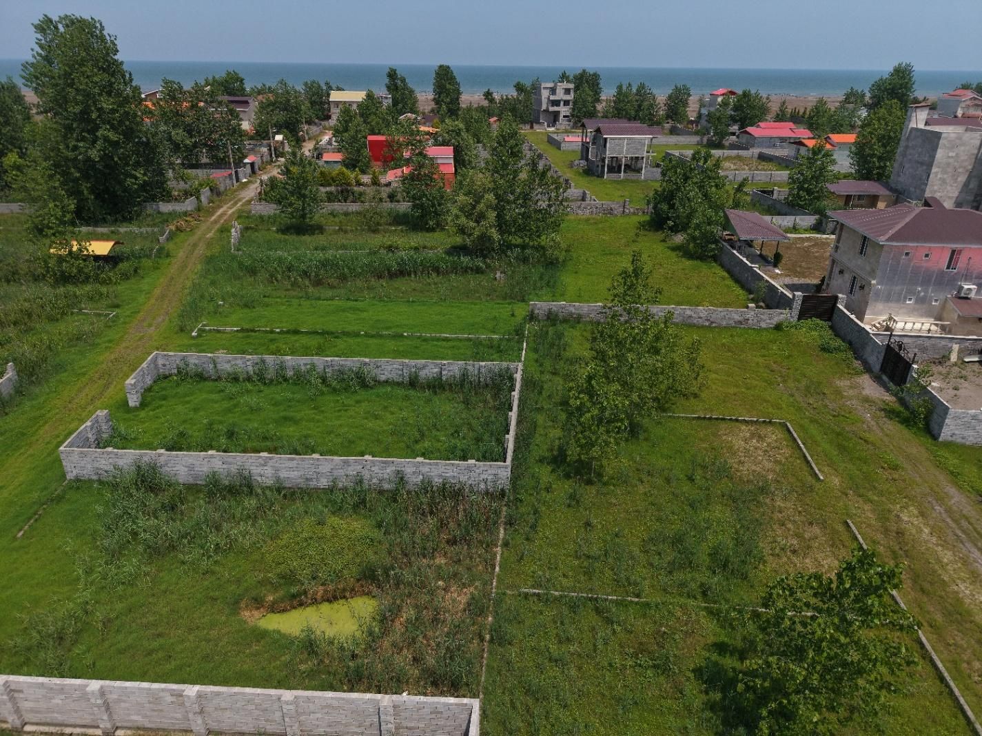 زمین ساحلی 2قطعه کنارهم بافت مسکونی مناسب ویلاسازی|فروش زمین و ملک کلنگی|رشت, کوی طالقانی|دیوار