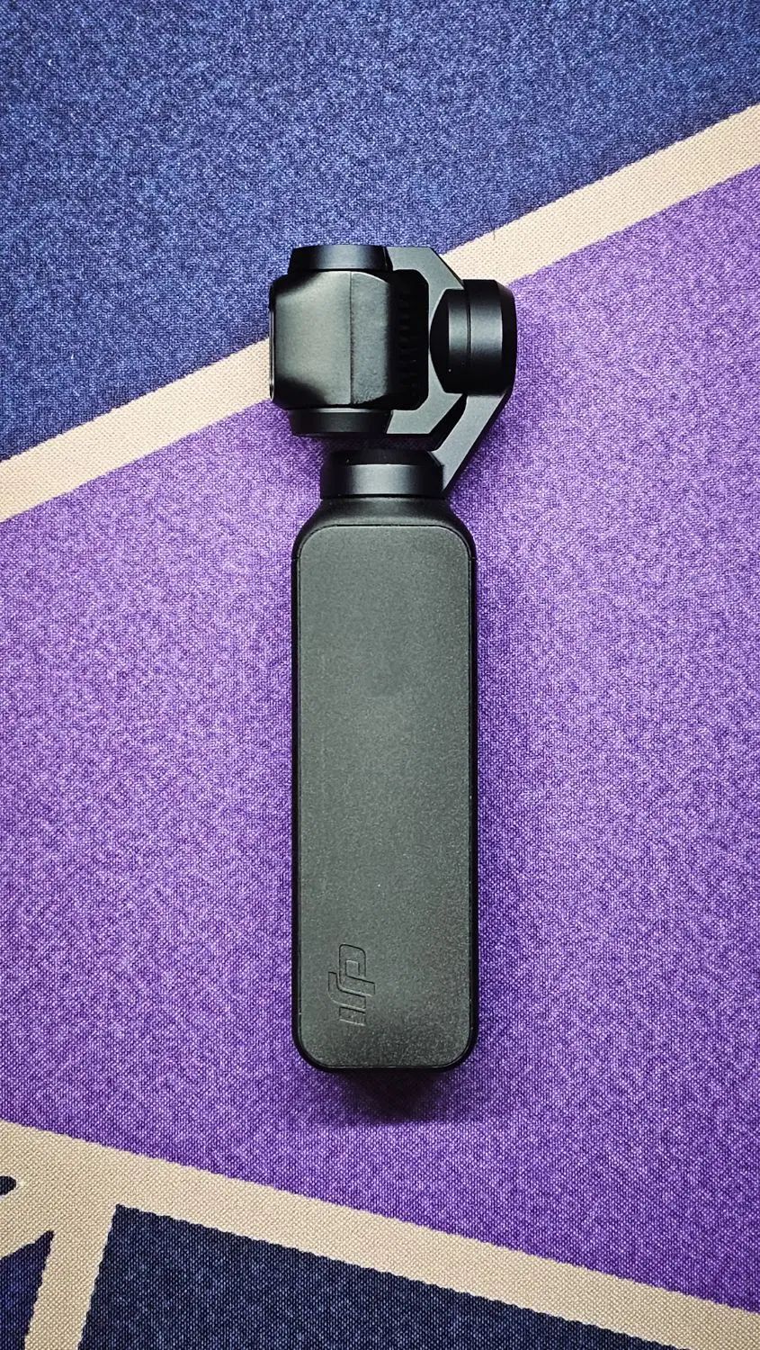 DJI Osmo Pocket + کیج + کنترل‌کننده گیمبال|دوربین عکاسی و فیلم‌برداری|رشت, گلسار|دیوار