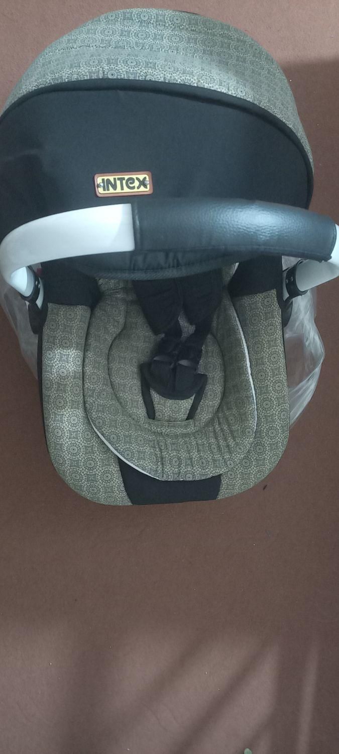 کالسکه و کریر بچه جنس اینتکس|اسباب و اثاث بچه|قم, نخودی|دیوار