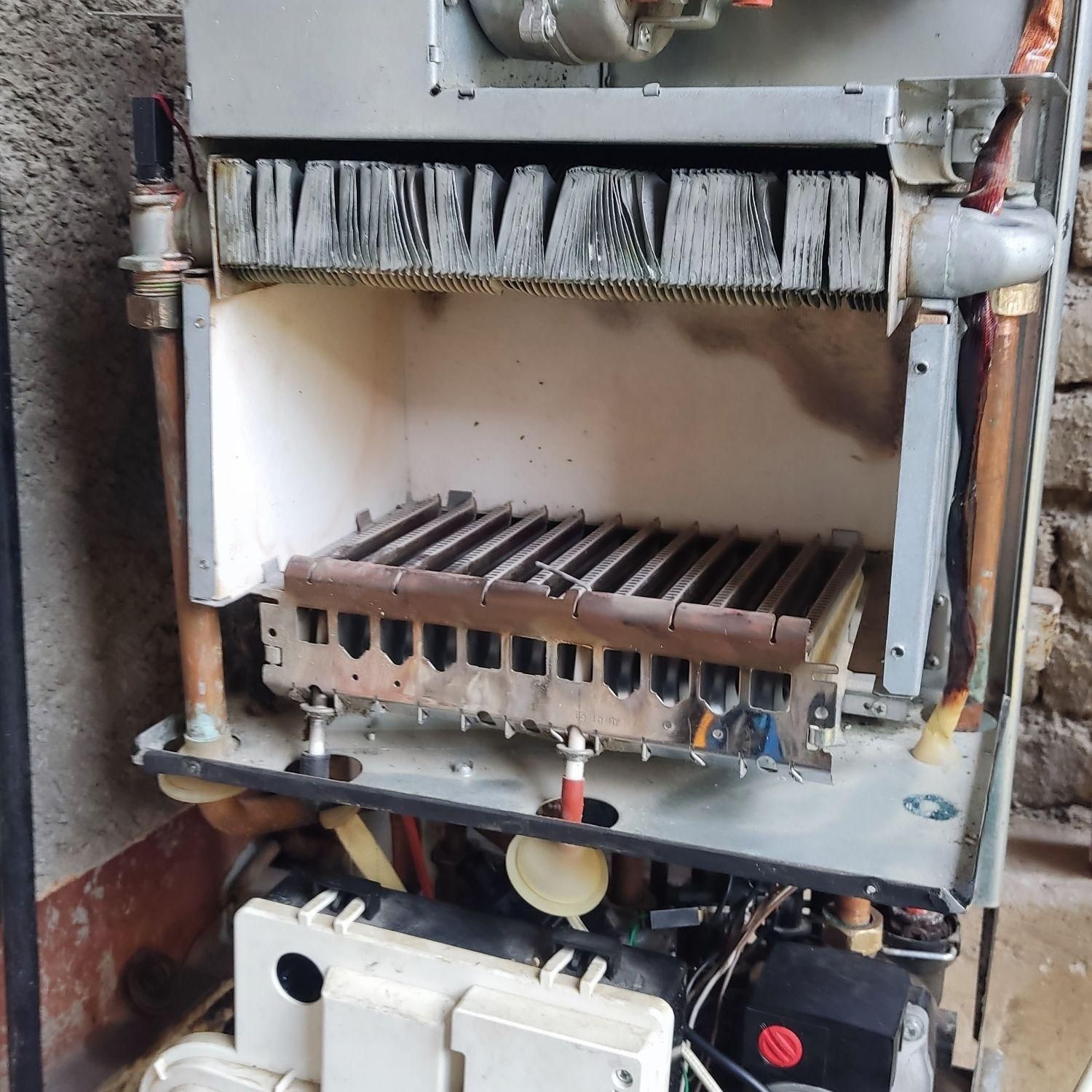 تاسیسات و خدمات فنی میرزایی|آبگرمکن، پکیج، شوفاژ|بومهن, |دیوار