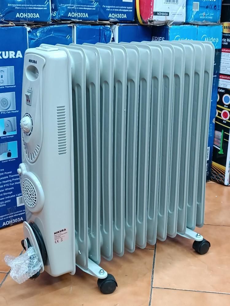 شوفاژبرقی نیکورا رادیاتور روغن13پره فن دار2900w|آبگرمکن، پکیج، شوفاژ|تهران, امین حضور|دیوار