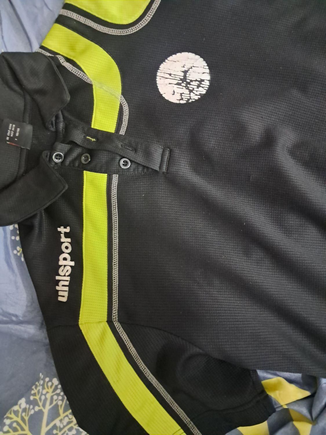 پیراهن آمریکایی آل اسپورت بازیکن تیم ذوب آهن. مشکی|لباس|کاشان, دروازه فین|دیوار