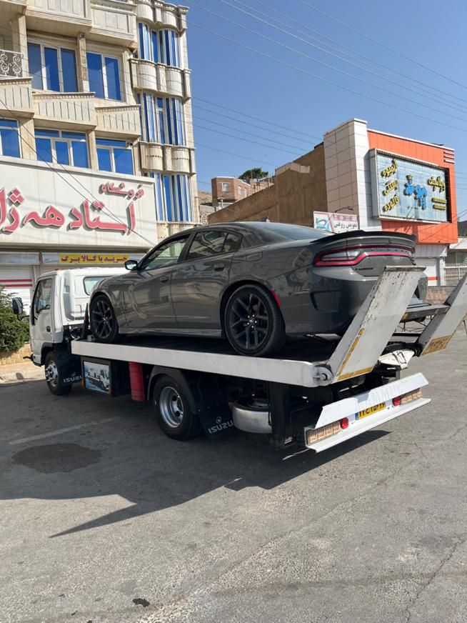 کفی خودروبر رشت جرثقیل حمل خودرو یدک کش ماشین بر|خدمات حمل و نقل|رشت, منظریه|دیوار