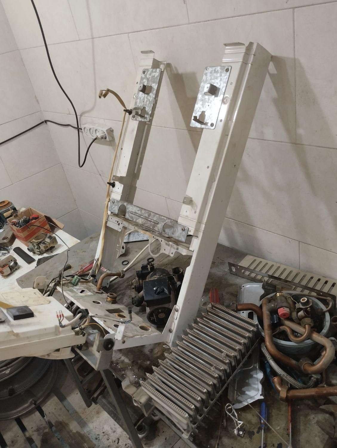 نمایندگی خدمات«پکیجشوفاژدیواری،رادیاتور»بوتان|خدمات پیشه و مهارت|نورآباد ممسنی, |دیوار