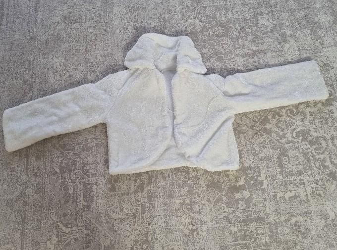 کت عروس، تاج عروس و تور.|لباس|فردیس, منظریه|دیوار