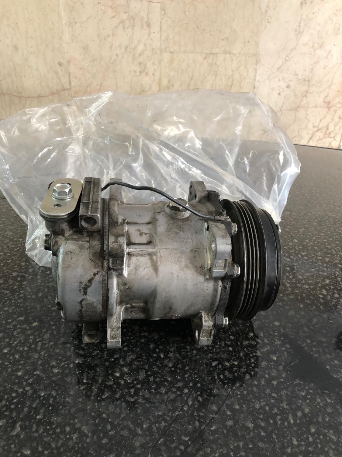 کمپرسور کولر ال۹۰پرایدکوییک۲۰۶ ۴۰۵ ورنا|قطعات یدکی و لوازم جانبی|تهران, تهرانپارس شرقی|دیوار