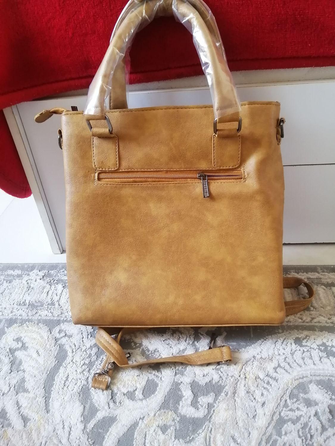 کیف رنگ کاراملی نو|کیف، کفش، کمربند|اندیشه, اندیشه فاز ۱|دیوار