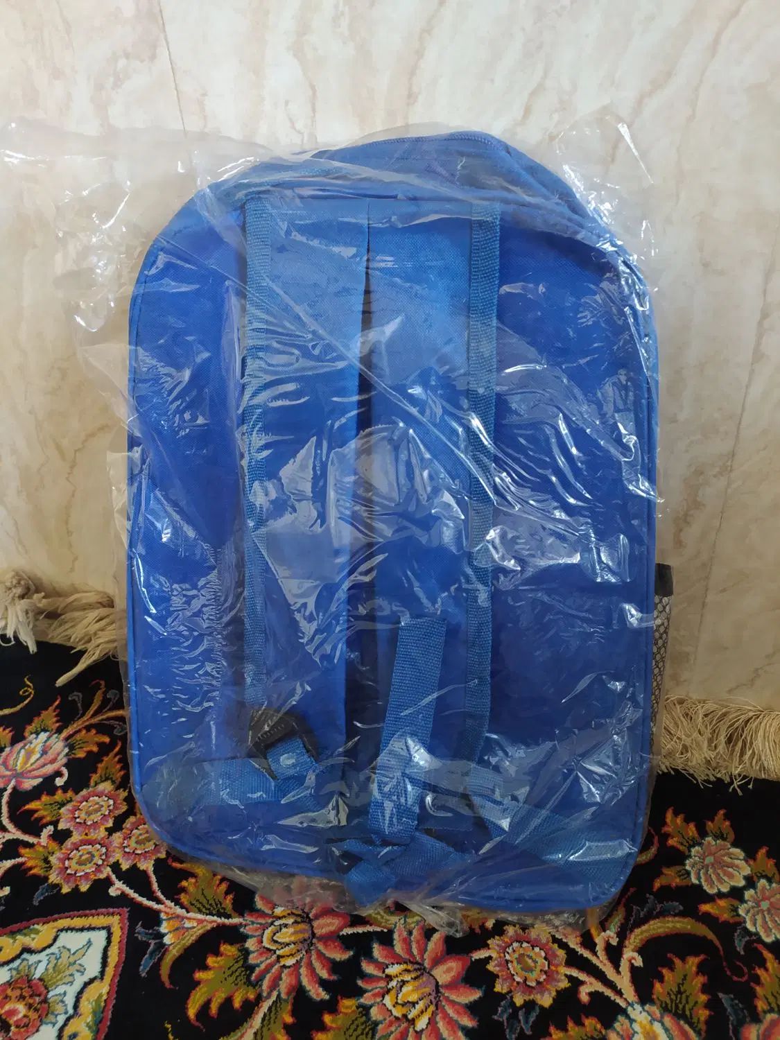 کیف دبستان|کیف، کفش، کمربند|اصفهان, لاله|دیوار