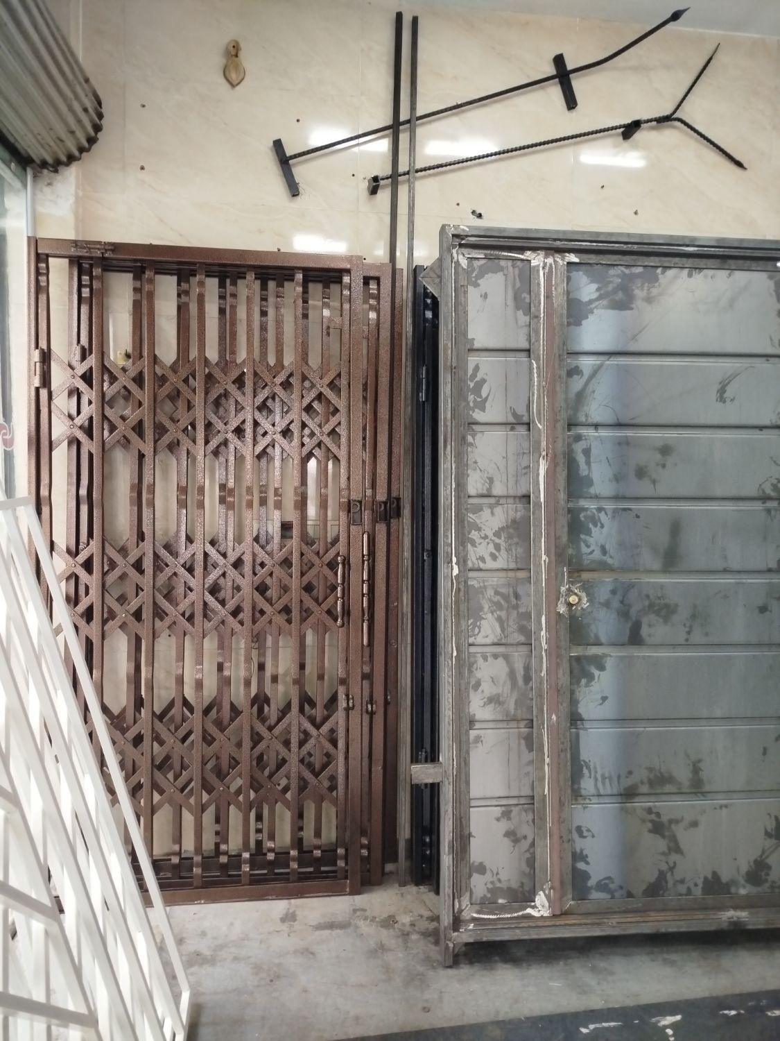 دزگیر درب اکاردیونی|مصالح و تجهیزات ساختمان|تهران, تسلیحات|دیوار