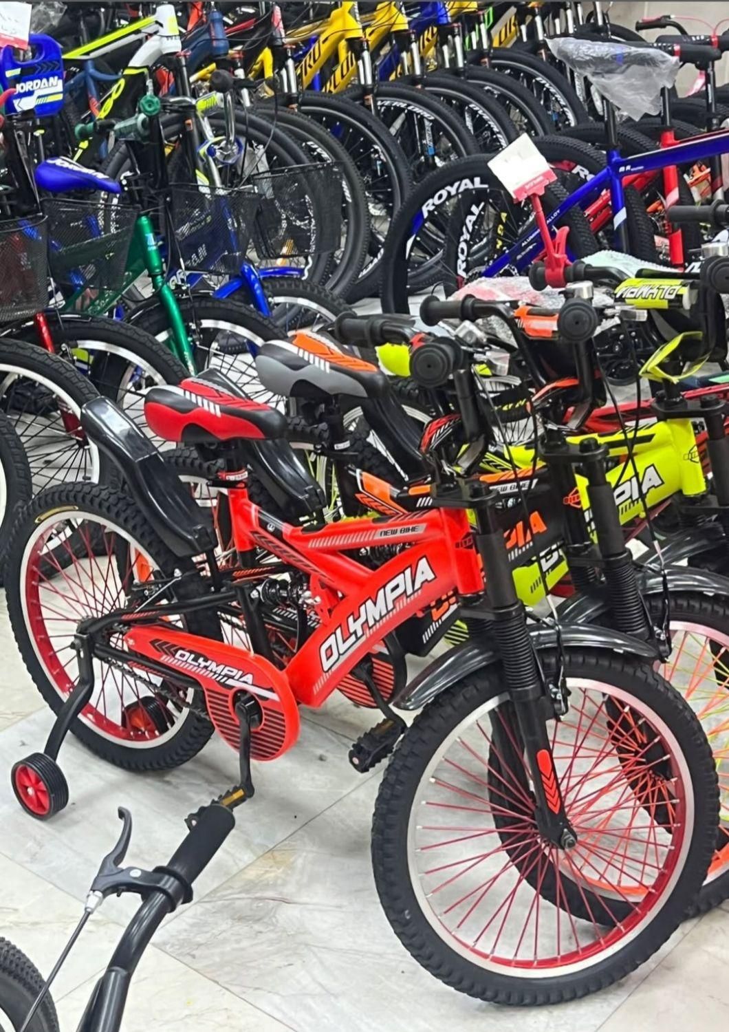 دوچرخه کمک فنر دار برند المپیا|دوچرخه، اسکیت، اسکوتر|کاشان, معلم|دیوار