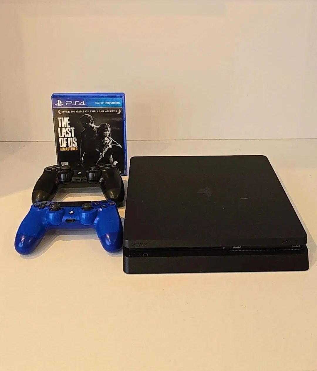 ps4 slim دودسته با بازی the last of us 1|کنسول، بازی ویدئویی و آنلاین|رشت, تازه آباد|دیوار