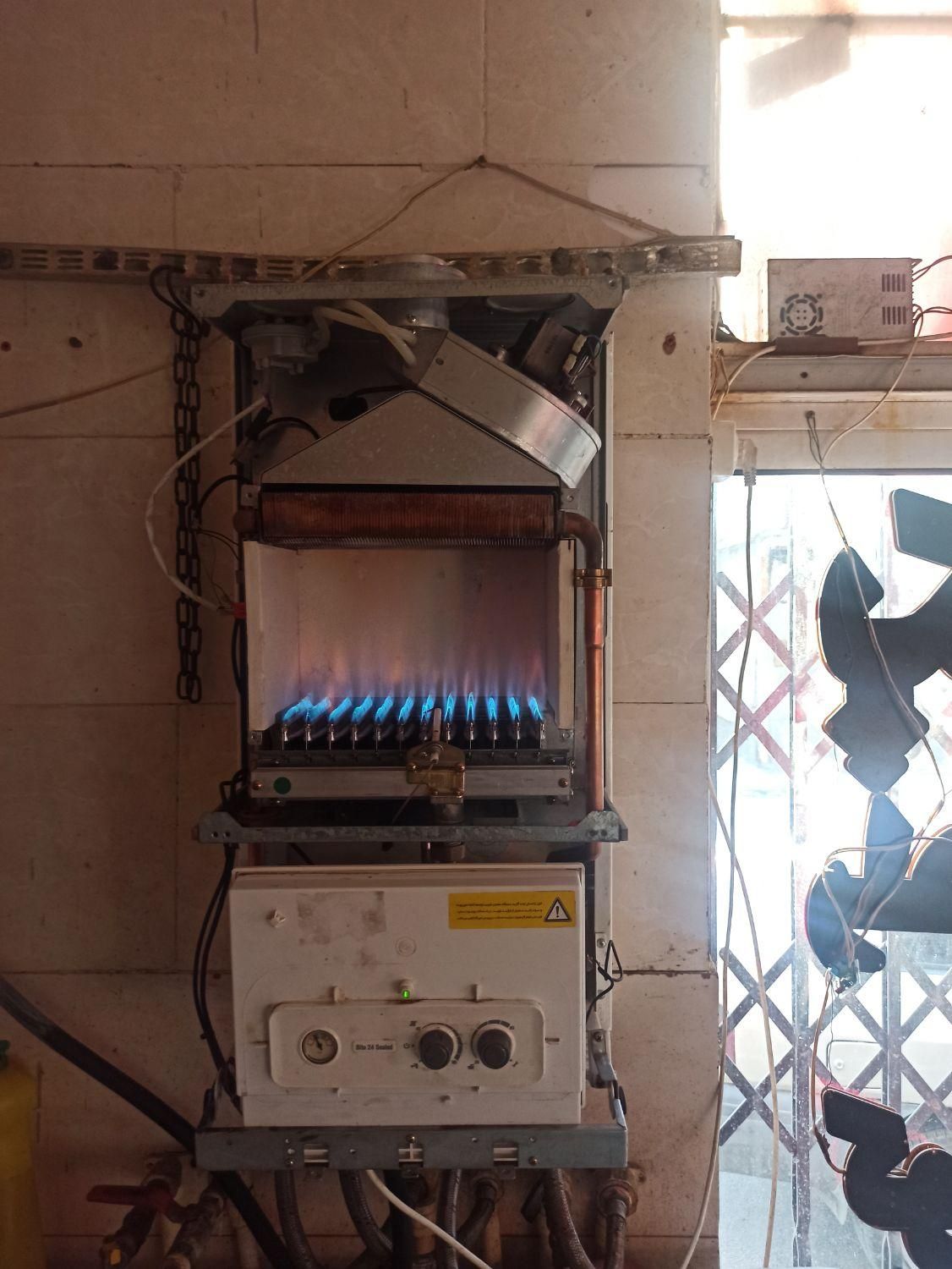 تعمیر تخصصی پکیج باضمانت کتبی|خدمات پیشه و مهارت|اراک, |دیوار