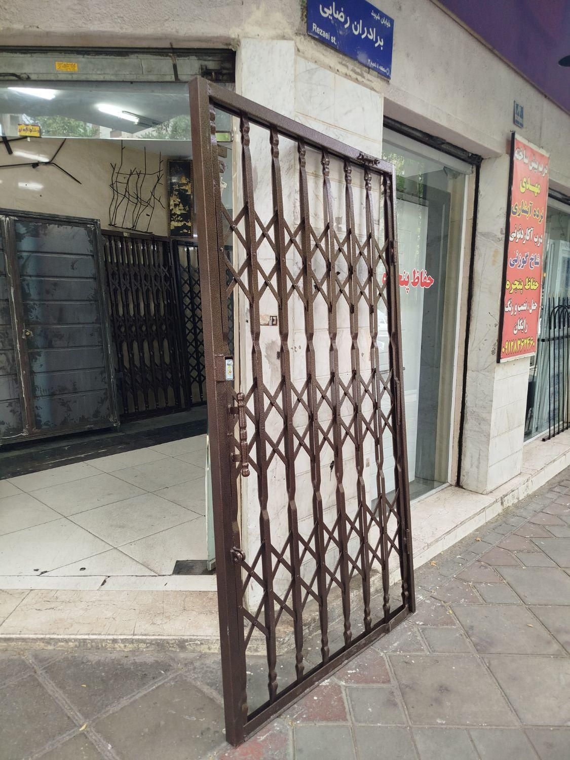 دزگیر درب اکاردیونی|مصالح و تجهیزات ساختمان|تهران, تسلیحات|دیوار