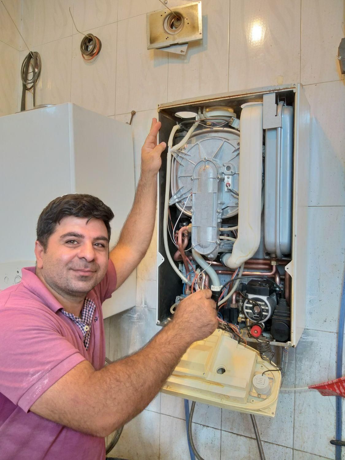 تعمیر تعمیرات پکیج و آبگرمکن دیواری|خدمات پیشه و مهارت|قم, شاه سید علی|دیوار