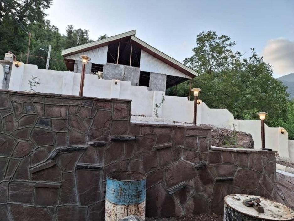 اجرای نصب سنگ مالون ولاشه|خدمات پیشه و مهارت|رشت, گیل|دیوار